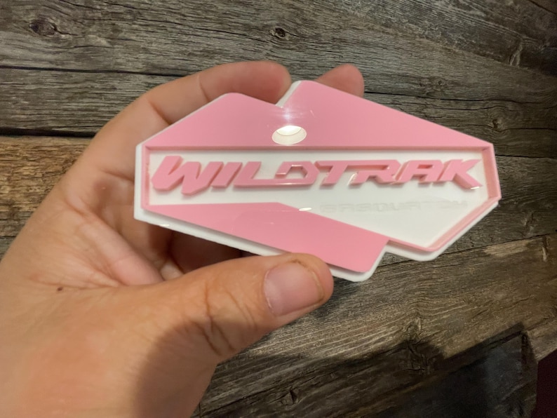 WILDTRAK-SASQUATCH Fender Badge: Pink on White Acrylic Emblem - Etsy