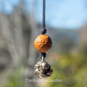 Brass Weeping Buddha Pendant, 0.5 Inches Tall, Includes Necklace Cord