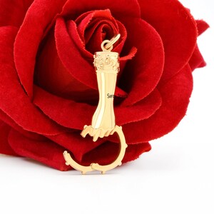 14k gouden handbedel: ringverbindingshanger (45 x 15 mm)