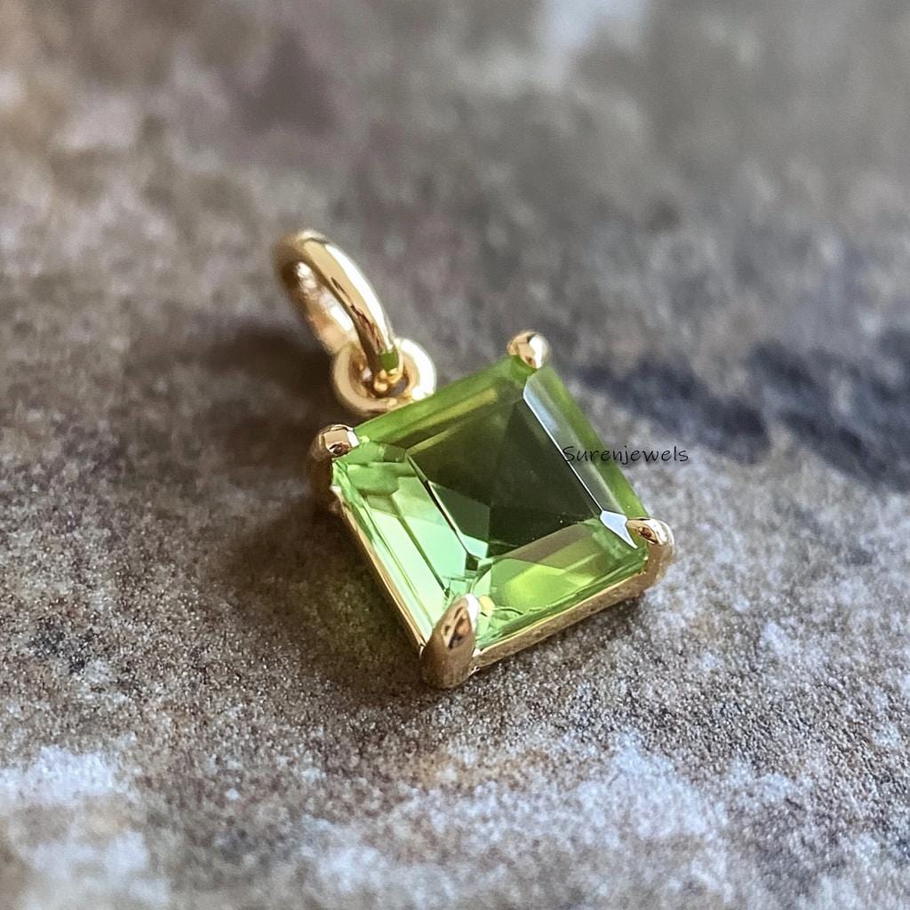 14K Gold Peridot Emerald Cut Solitaire Pendant: Bezel Setting - View 2 - Suren Jewels | SKU: SJP4361-SLNSBCH-15M