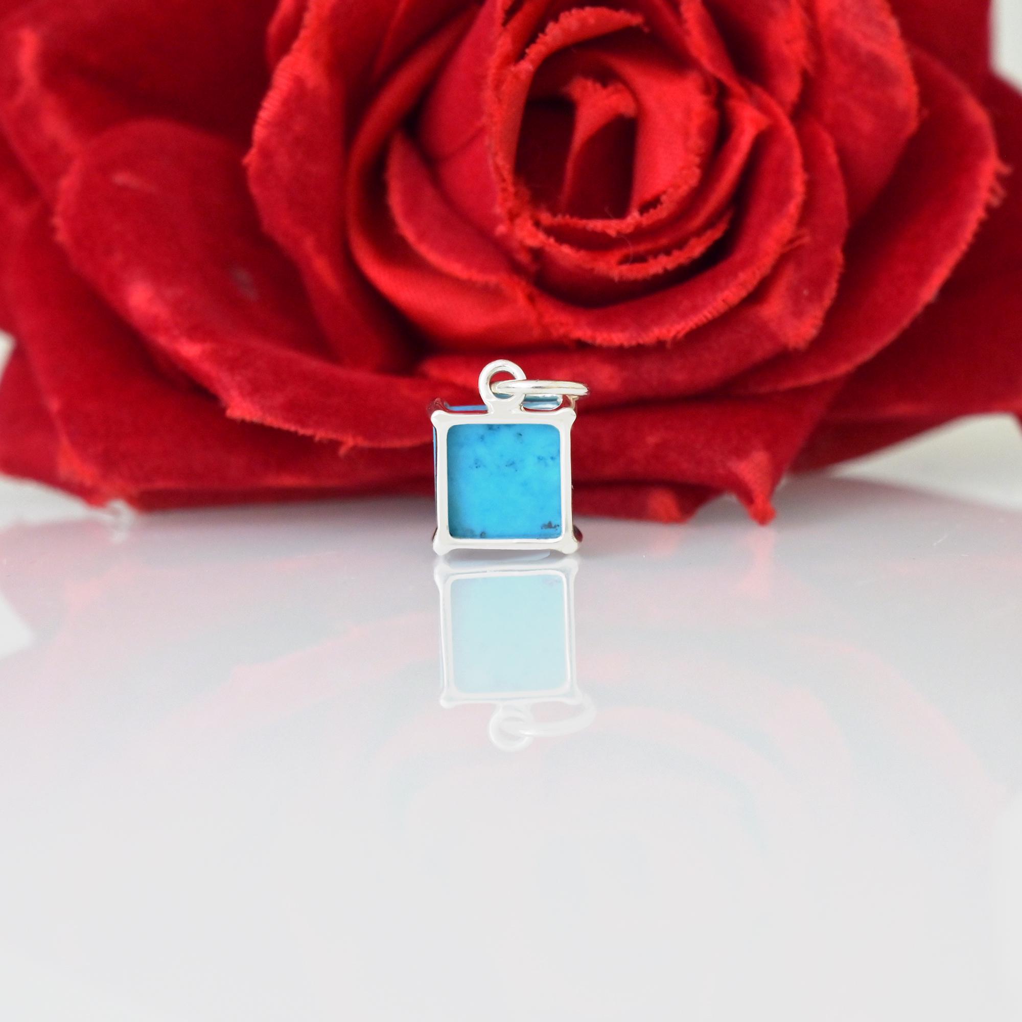 14K Gold Peridot Emerald Cut Solitaire Pendant: Bezel Setting - View 5 - Suren Jewels | SKU: SJP4361-SLNSBCH-15M