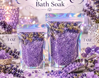 May include: Two holographic pouches of P#$$Y F@!RY Bath Soak, one labelled 3 oz and one 7 oz. The pouches contain purple bath salts topped with dried lavender flowers. A metal scoop filled with purple salts sits nearby on a marble surface.