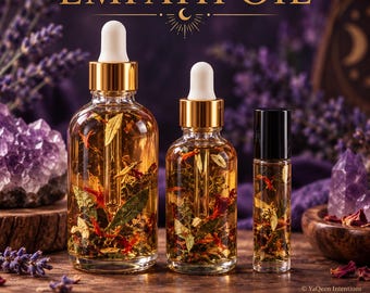 May include: Three clear glass bottles containing golden oil with visible dried herbs and petals. The set includes a large dropper bottle labeled 2 oz, a smaller dropper bottle, and a 1/3 oz roll-on bottle. The text EMPATH OIL is displayed above.