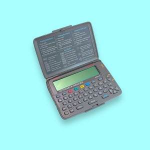BOOKMAN digitale portatile vintage degli anni '90.