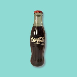 Vintage 2000 Cola cola bottle FULL