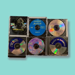 Jogos de computador em CD antigos.