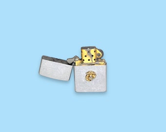 Vintage Silver Zippo Lighter. Gold Emblem.