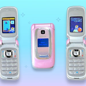 Teléfono celular Nokia Flip rosa Y2K vintage de los años 90. Raro.