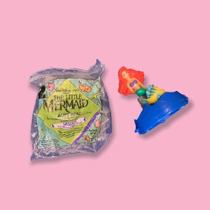 Vintage 90s Disney little mermaid toys.