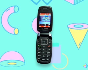 May include: Black Samsung flip phone, open to reveal a screen displaying a game. The phone has a keypad with numbers and function keys. The background is a light blue with colorful geometric shapes.