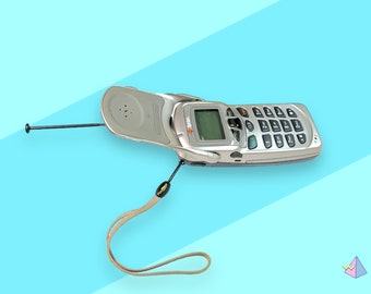 Vintage 90s Samsung Flip Cell Phone.