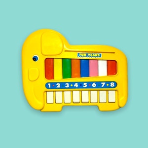 Vintage 90s Toy Music Keyboard.