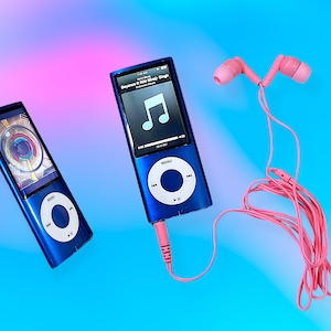 May include: Two blue iPods with white control buttons and screens displaying music interfaces. Pink earbuds and a pink cord are also present. The background is a gradient of pink and blue.