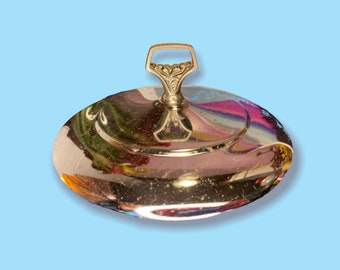 Coperchio decorativo per piatto in argento vintage.