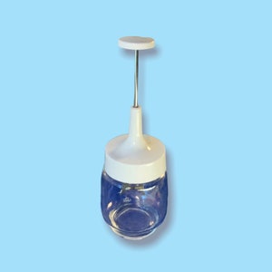 Vintage Glass Jar Kitchen chopper Utensil.