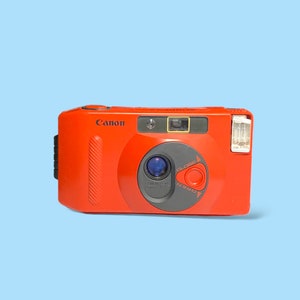 Vintage Red Canon Camera.