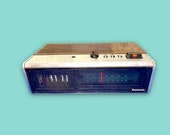 Vintage Panasonic Flip Radio Clock.