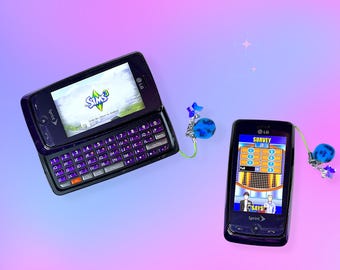 May include: Two black LG Sprint cell phones with screens displaying video game graphics. One phone is open, revealing a keyboard with purple keys. The other phone shows a game interface. Blue and silver decorative accents are on the side.