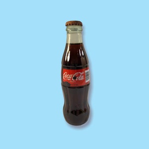 Vintage coke classic 8 oz FULL Unopened Bottle.