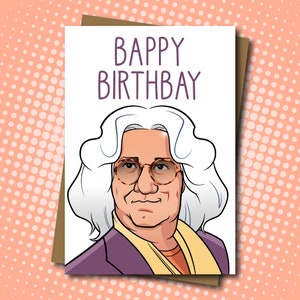 May include: A white card with the text "BAPPY BIRTHBAY" in purple lettering. A cartoon illustration of a person with long white hair, wearing glasses, a purple jacket, and a yellow scarf.
