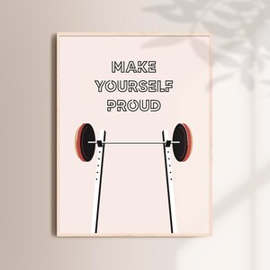 May include: A motivational poster with a barbell and the text "MAKE YOURSELF PROUD" in black letters on a light pink background.
