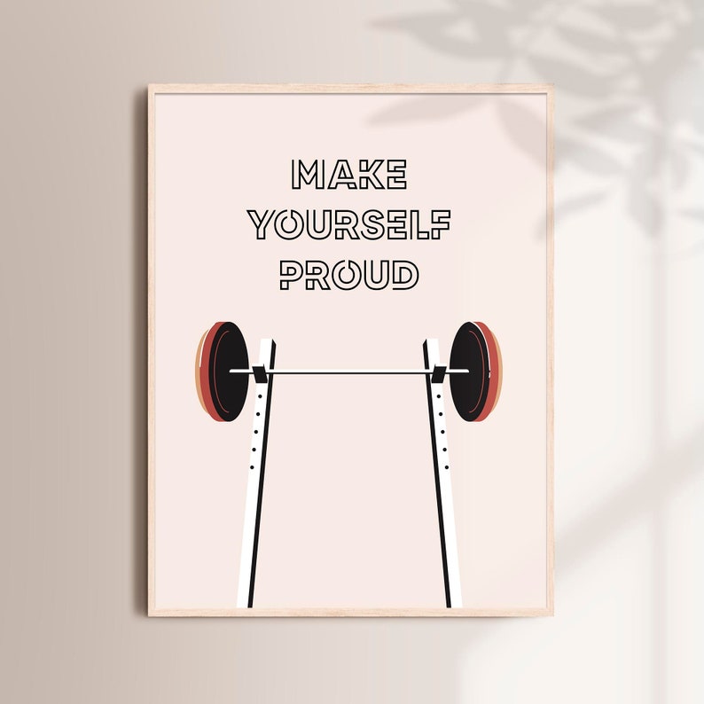 May include: A motivational poster with a barbell and the text "MAKE YOURSELF PROUD" in black letters on a light pink background.