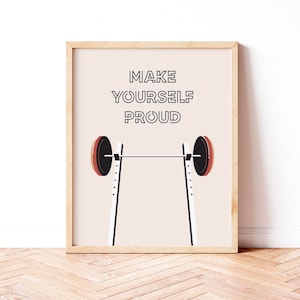 May include: A motivational poster with a barbell on a squat rack and the text "MAKE YOURSELF PROUD" in black letters on a light pink background.