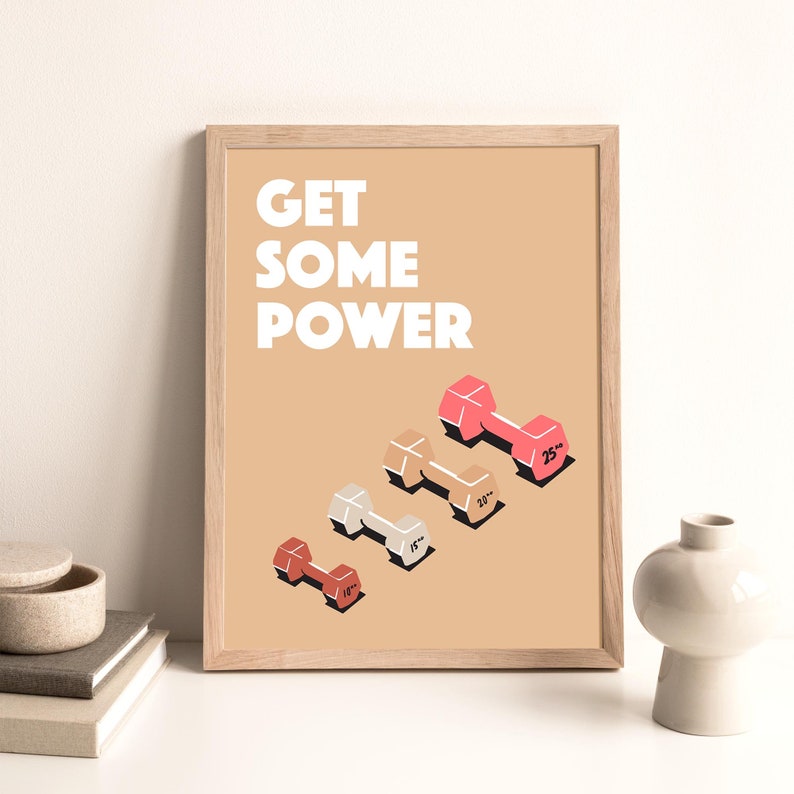 May include: A motivational poster with the text "GET SOME POWER" in white letters on a light brown background. Five pink, white, and brown dumbbells are arranged in a diagonal line, with the weights labeled in inches.