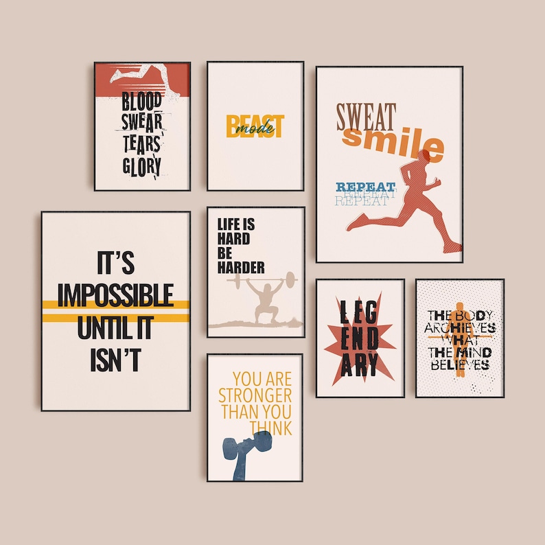 May include: Nine motivational fitness posters with inspirational quotes in black and white text on a white background. The posters have a variety of colors, including red, orange, yellow, blue, and gray. The posters are arranged in a grid pattern on a light brown wall.