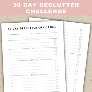 May include: A printable 30-day declutter challenge checklist with two columns. The left column has numbers 1 through 15 and the right column has checkboxes. The text "30 Day Declutter Challenge" is at the top of the page.