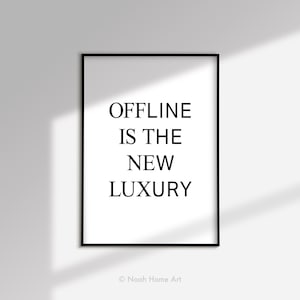 May include: Black and white printable wall art with the text "OFFLINE IS THE NEW LUXURY" in a minimalist style.