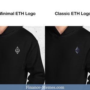 May include: Two black hoodies with different Ethereum logos. The hoodie on the left has a minimalist silver Ethereum logo. The hoodie on the right has a classic blue and grey Ethereum logo.