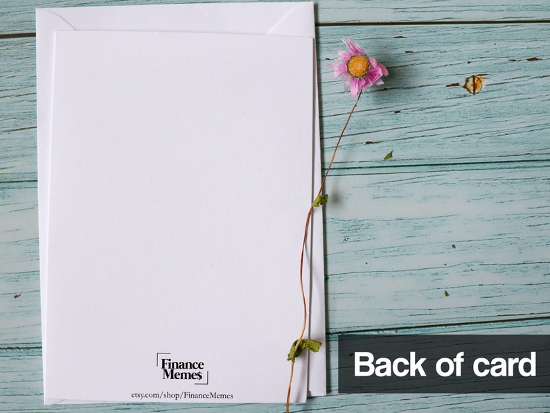May include: The back of a white card with a small black square with the text 'Finance Memes' and the text 'etsy.com/shop/FinanceMemes' below it.