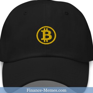 May include: Black baseball cap with a yellow embroidered Bitcoin logo.