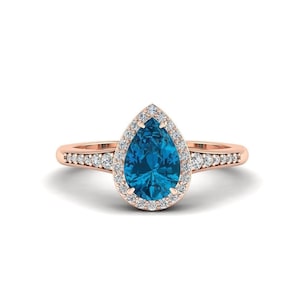 Halo London Blue Topaz Engagement Ring: Pear Silver Rose Gold Band
