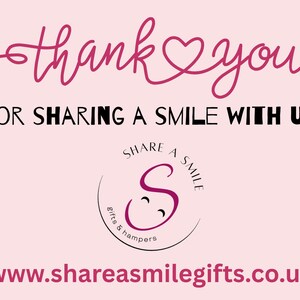 May include: A pink graphic with the words "thank you" in a cursive font, followed by "FOR SHARING A SMILE WITH US" in a bold font. A logo with the text "SHARE A SMILE" and a website address is also present.