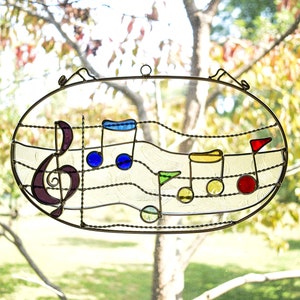 Music in Oval Wire Frame