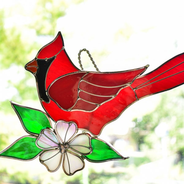 Cardinals with a Dogwood Flower Male and Female
