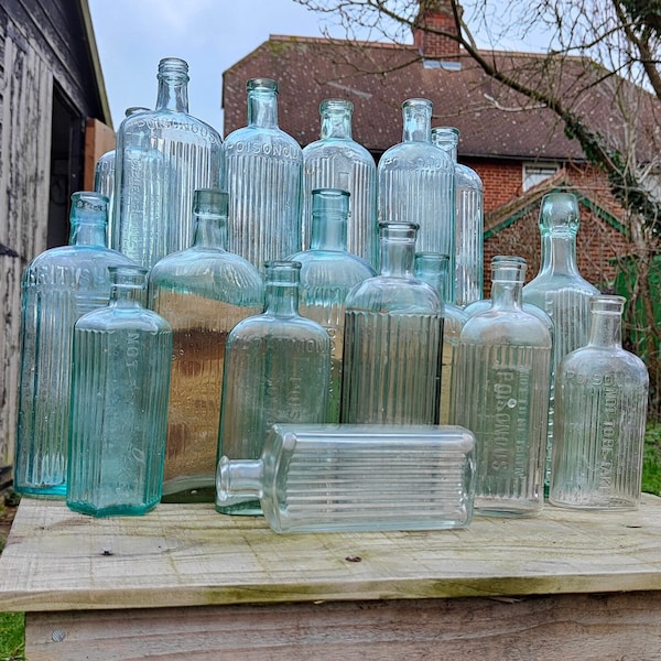 BARGAIN Poison Bottles - antique embossed bottles, not to be taken