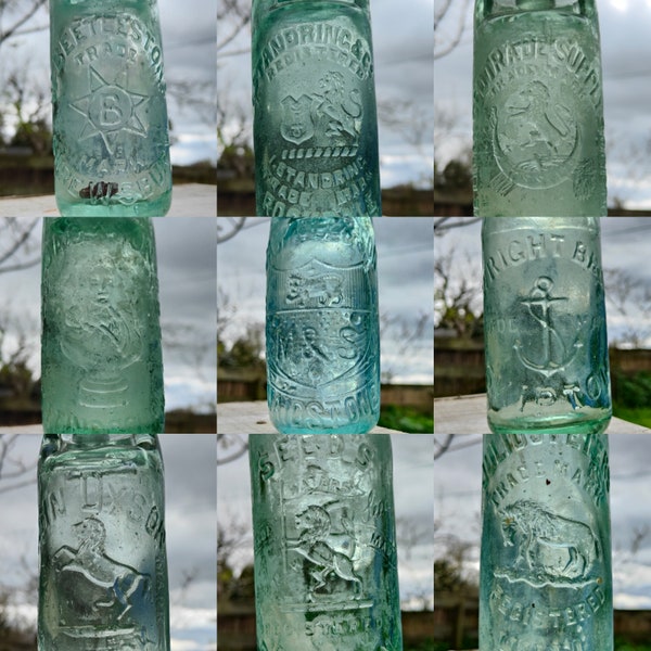 Pictorial Codd Bottles - antique mineral water bottles with marble stopper