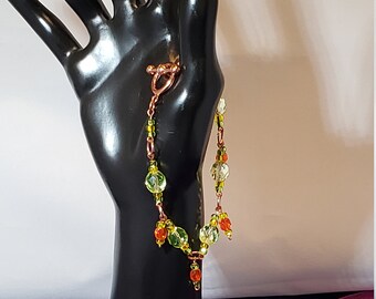 Pale green, sunshine yellow and tangerine glass bead bracelet