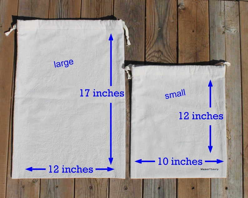 May include: Two white cotton drawstring bags, one labeled "large" measuring 17 inches tall and 12 inches wide, and the other labeled "small" measuring 12 inches tall and 10 inches wide.