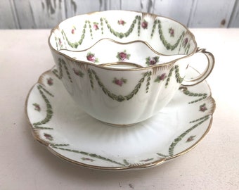 Rare Stunning Antique Large Fine China Gilded Moustache Teacup and Saucer by Crescent England with beautiful swagged regency design