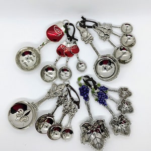 4 piece Measuring Spoons in Fleur de Lis Grapes Gnomes Turtles Roosters Cows Cats and Celestial