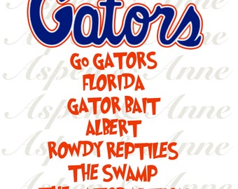 May include: A blue and white graphic of the word "Gators" with the text "Go Gators Florida Gator Bait Albert Rowdy Reptiles The Swamp The Gator Nation" in orange below.