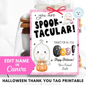 May include: A rectangular Halloween gift tag featuring a white background with a pink spiderweb border. The text reads "you are SPOOK-TACULAR!" with illustrations of two ghosts, a pumpkin bucket, and the word "BOO!" in colourful bubble letters.