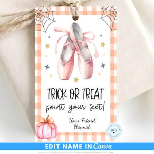 May include: A rectangular gift tag with a light orange gingham border, featuring a pair of pink ballet slippers, black spider webs, and gold stars. The text reads: TRICK OR TREAT point your feet! Your Friend, Hannah. A pink pumpkin is at the bottom.