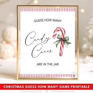 May include: A framed Christmas game printable with the text "Guess How Many Candy Canes Are in the Jar." The sign features a watercolor candy cane with a green bow. The frame is gold with a white background.