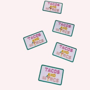 May include: Rectangular patches with the text "TACOS AND MYRCS" in pink and yellow, with a cocktail glass illustration. The patches have a white background and a green border. The patches are scattered across a light pink background.
