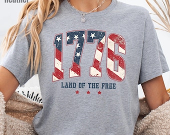 Camiseta "Tierra de los Libres 1776", camiseta de regalo para patriotas estadounidenses, ropa con bandera desgastada.